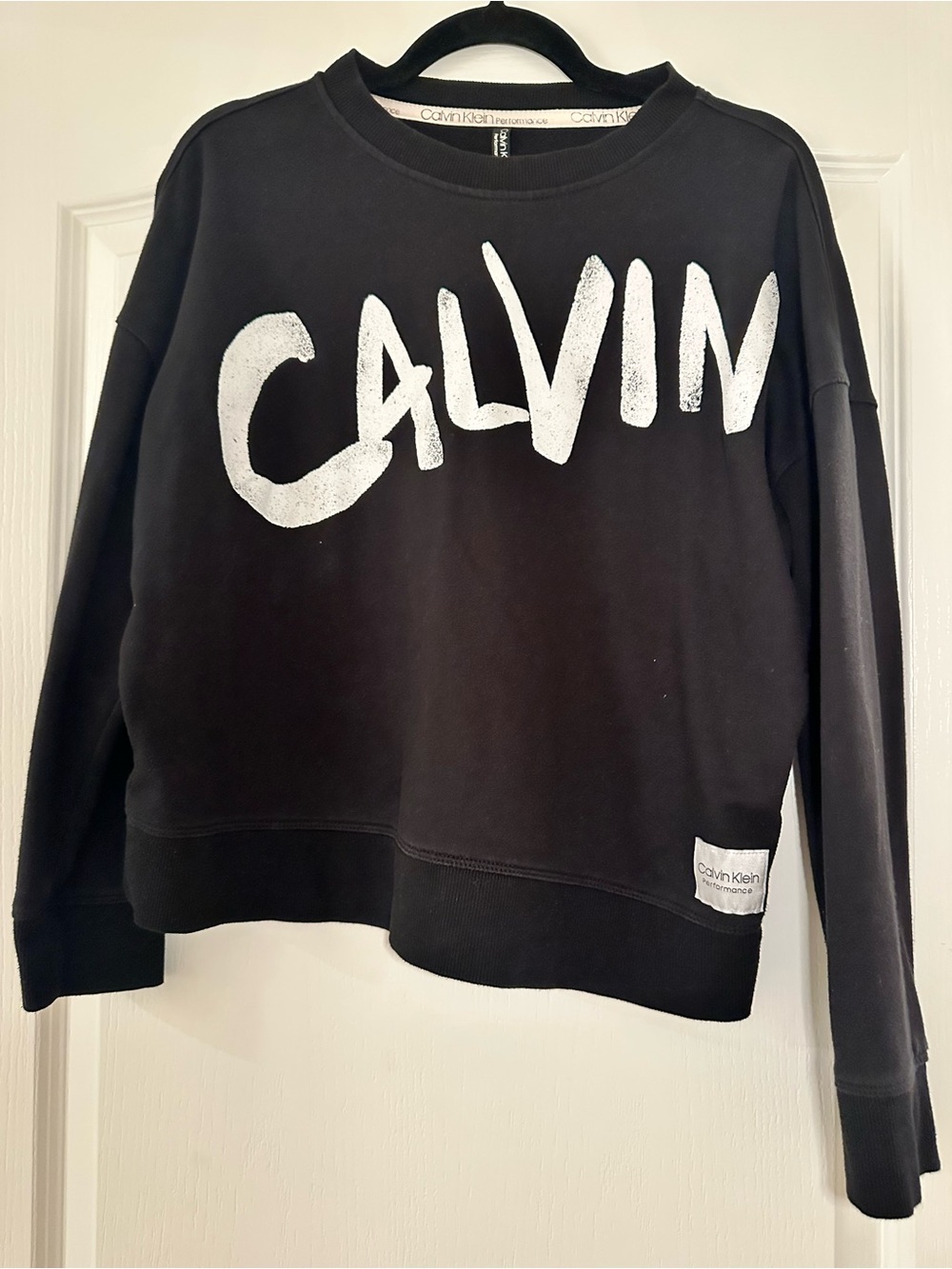 Calvin Klein Black Crewneck Sweater with White 'CALVIN' Graphic